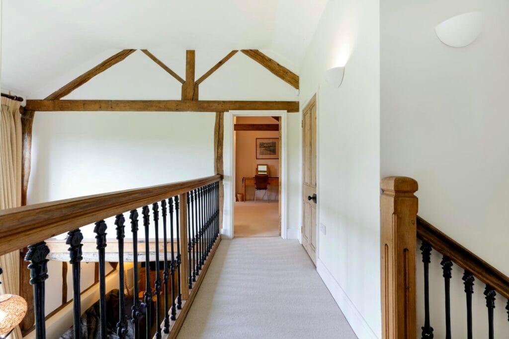 Galleried landing with views over the front garden, living room and dining room
