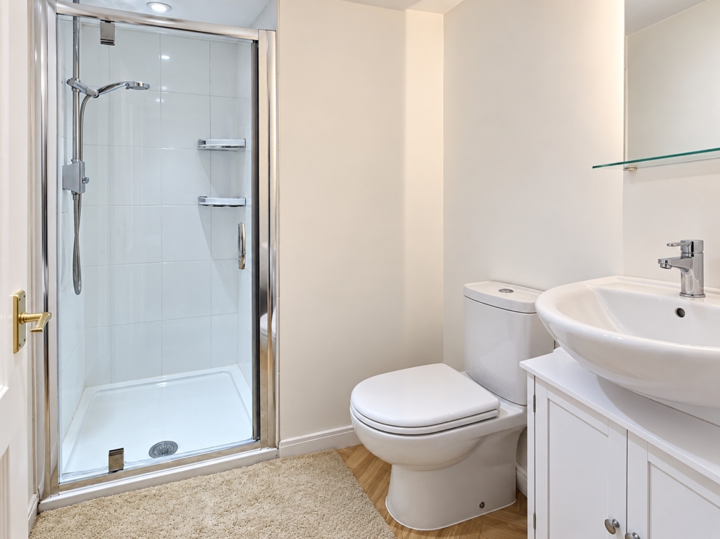 Shower room with WC and basin in Loddon Hall Cottage, Norfolk