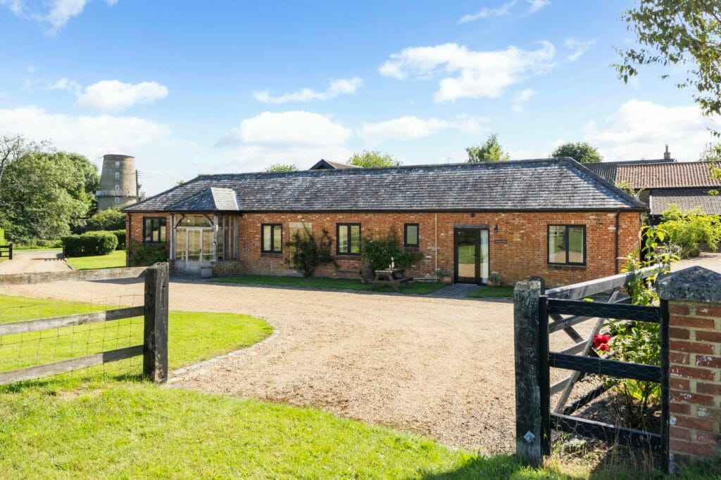 A view of the Kitchen and Annexe from the Garden during the day
