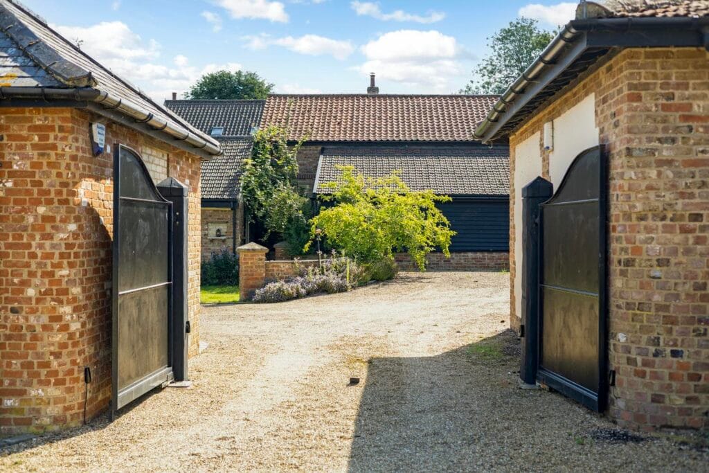 Electric gates entering the Courtyard Garden