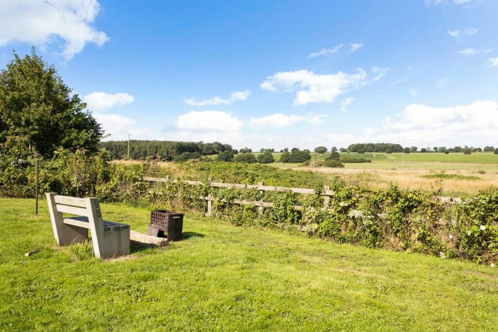 Views from the main garden during the day across farmland