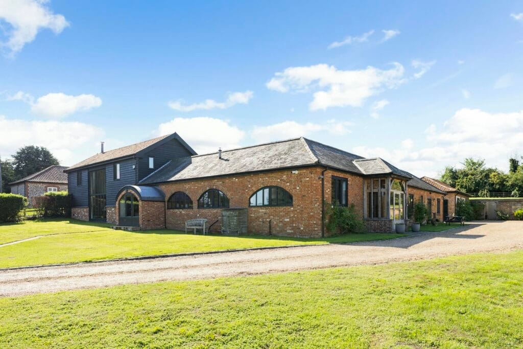 Front View – Mill Farm Barn in Sun