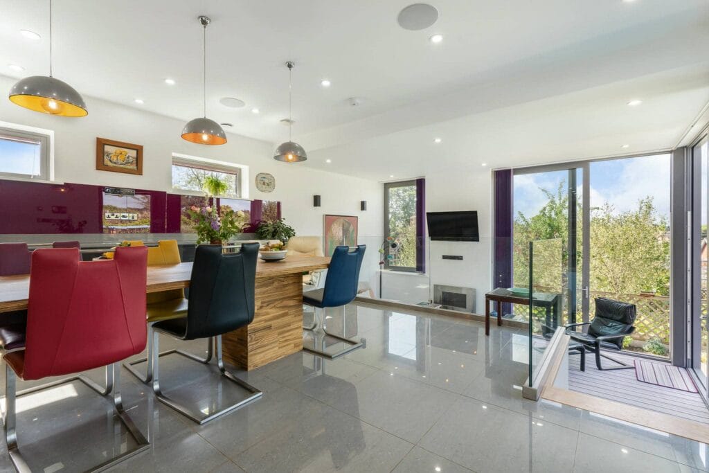 Kitchen dining area with snug and garden views.
