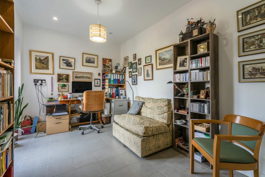 Charming study overlooking the herb garden, perfect for quiet work or reading.