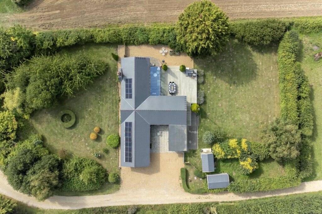 Bird’s-eye view of the landscaped gardens and home