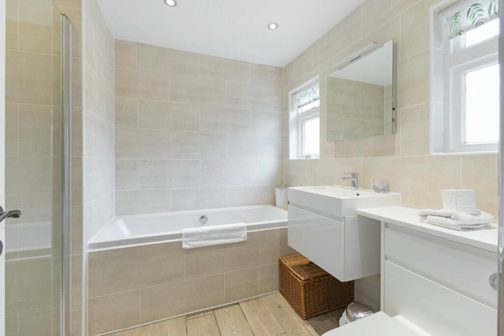 Family bathroom with bath and separate shower
