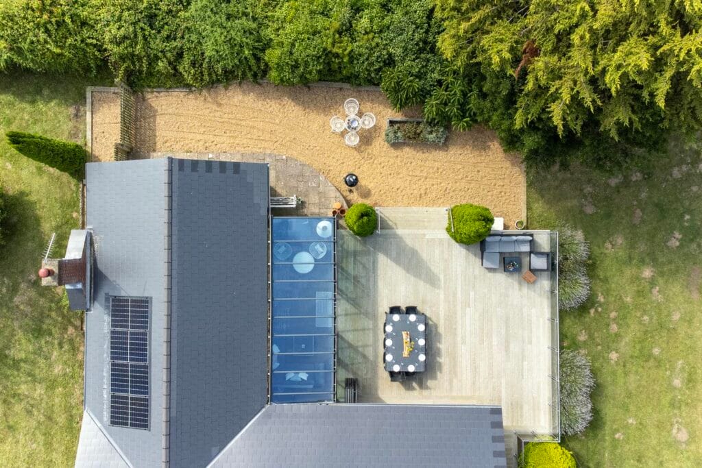 Bird’s-eye view showcasing the sun room and expansive terrace