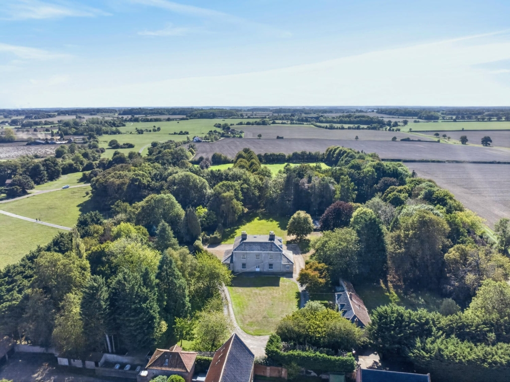 Aerial view of Loddon Hall and its parkland, woodland and Norfolk countryside