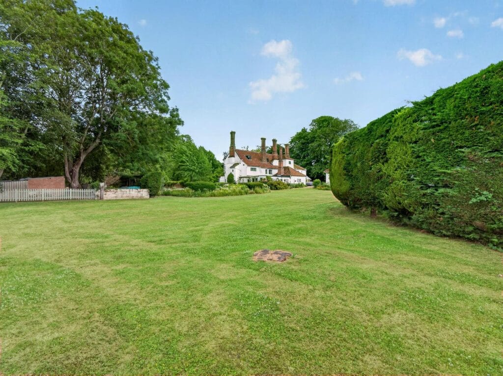 Sweeping front lawn with Bury's Hall Ashill property beyond