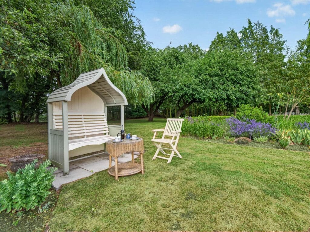 Bury's Hall Ashill garden arbour seat beside lavender borders