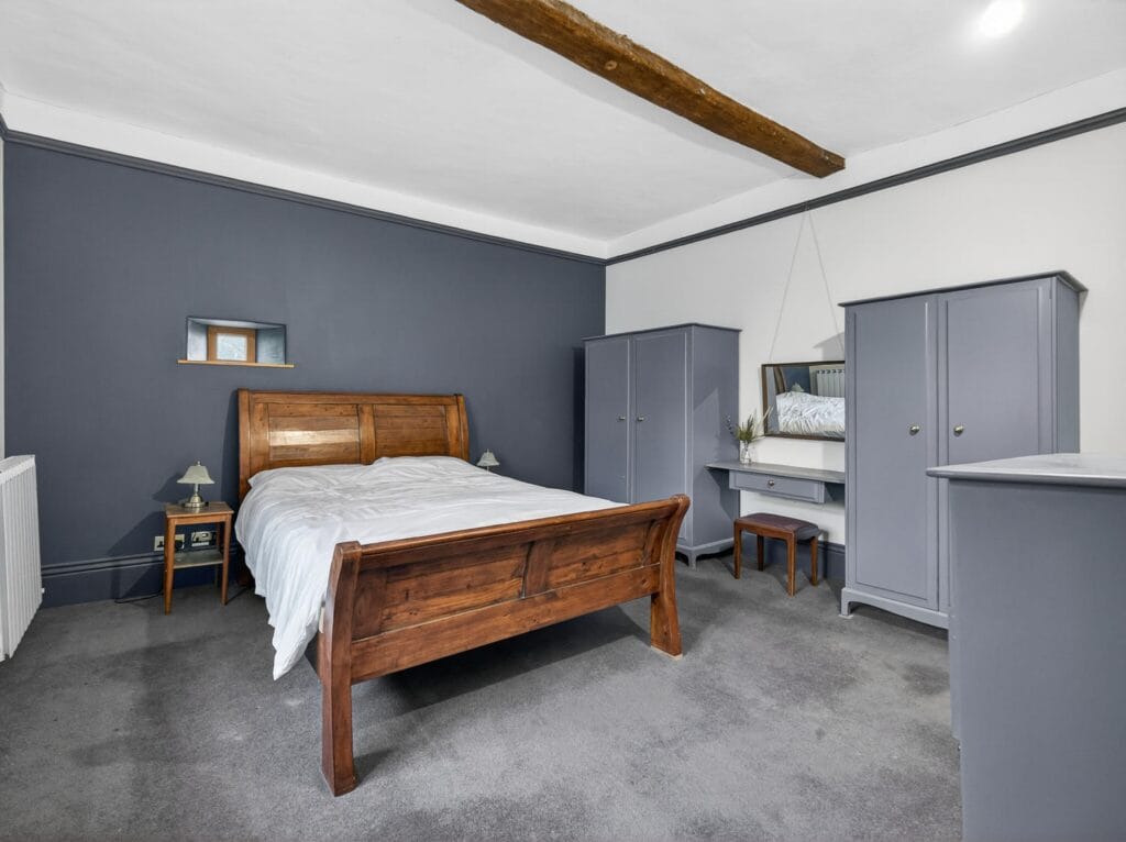 Large bedroom with beams