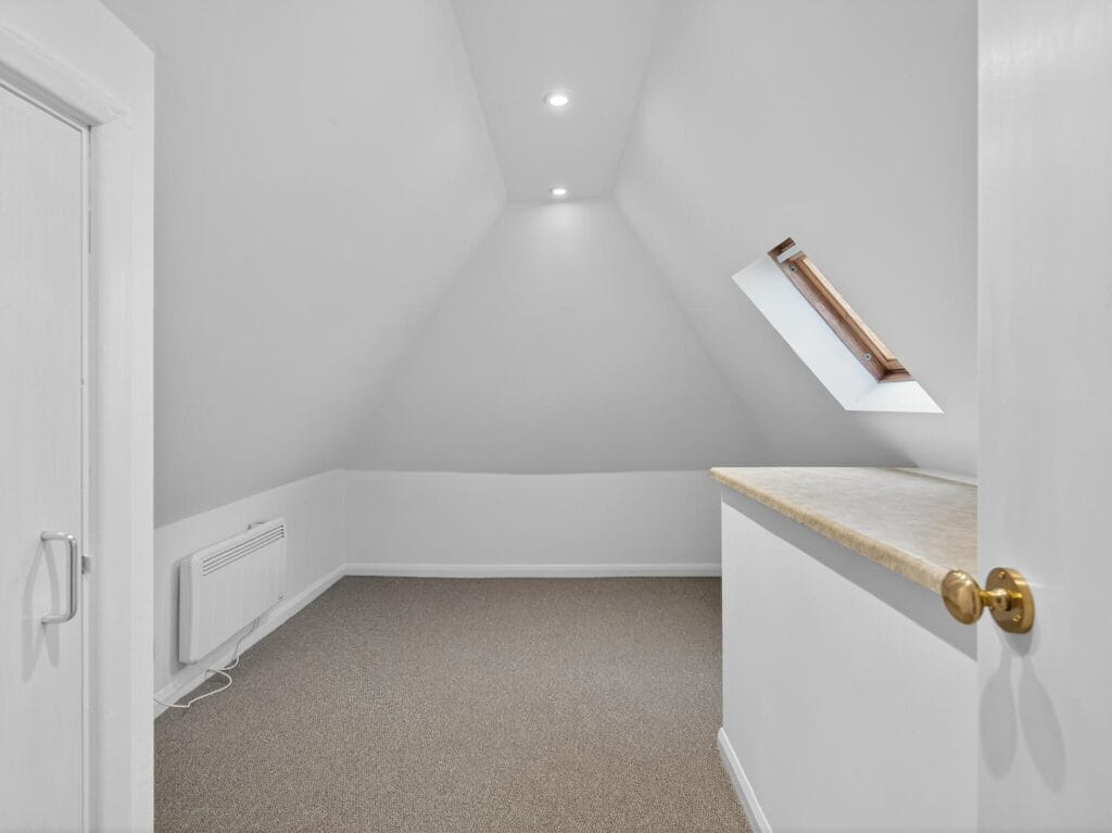 Loft bedroom with skylight