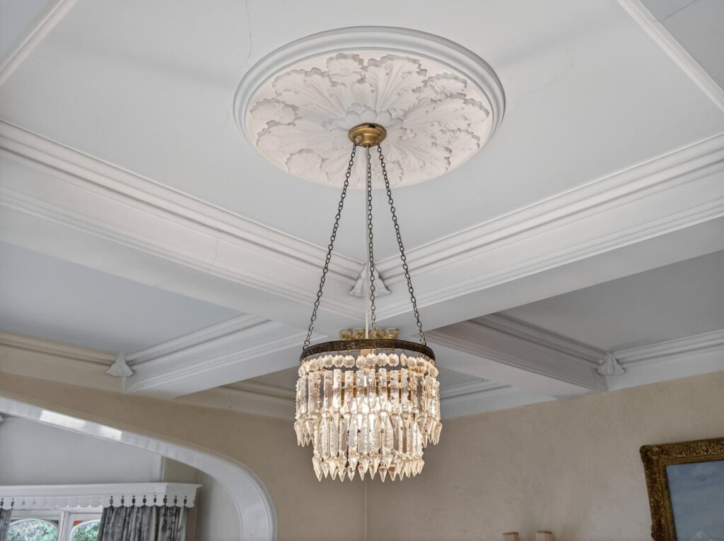 Ornate plaster ceiling rose and coffered ceiling detail in The Priory Suffolk
