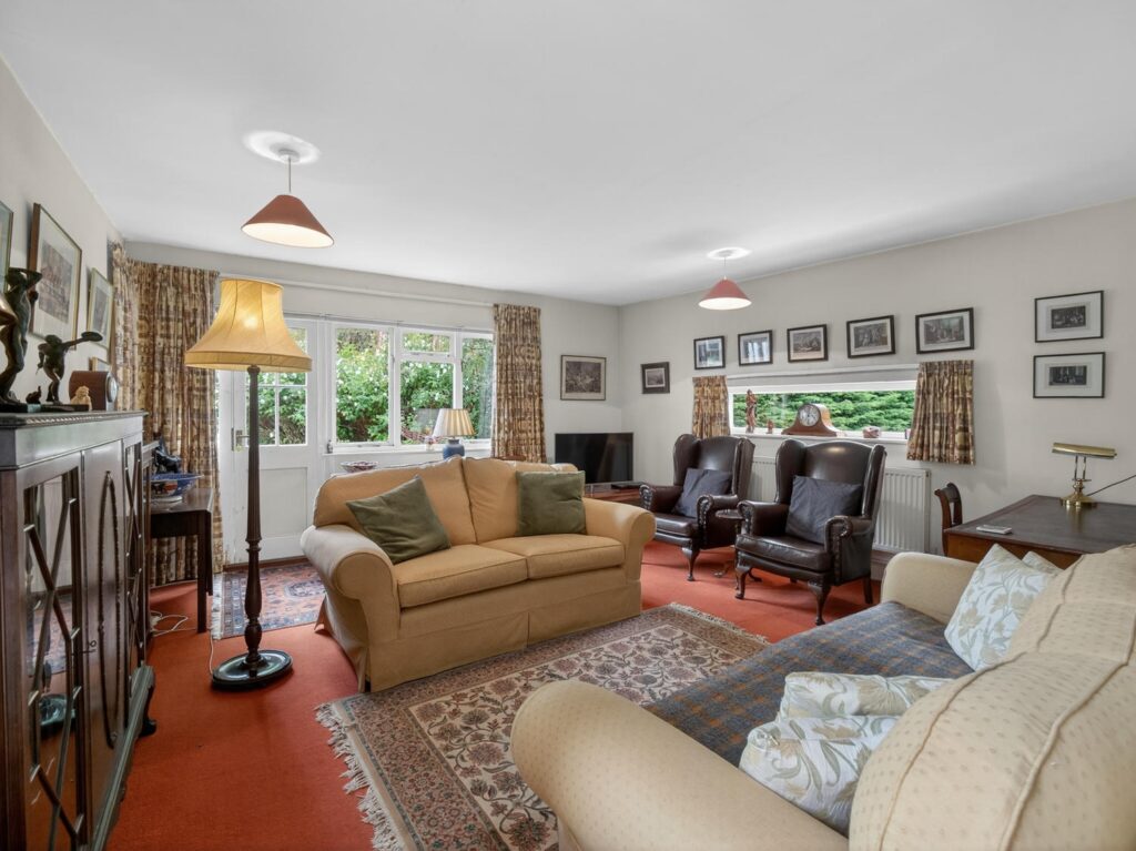 Rear drawing room at The Priory Suffolk with dual aspect windows and direct access to the garden