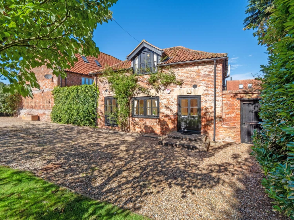 Stable Cottage brick annexe with gravel yard at Loddon Hall, Norfolk