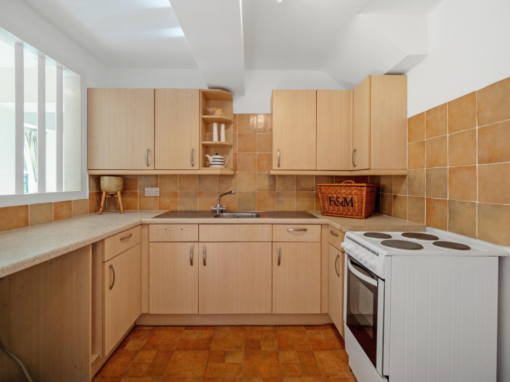 Fitted kitchen in Stable Cottage annexe at Loddon Hall, Norfolk