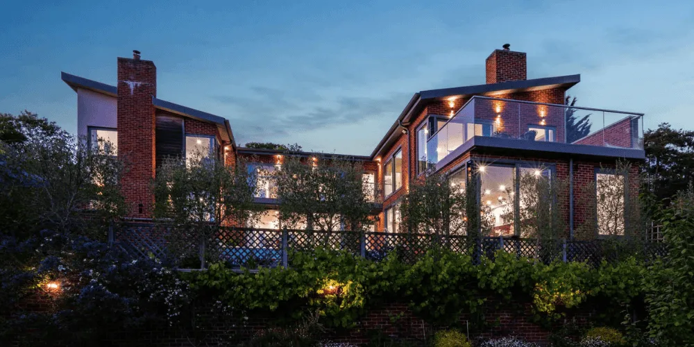 Exterior of a premium UK country home represented by The Ivybridge Collection.