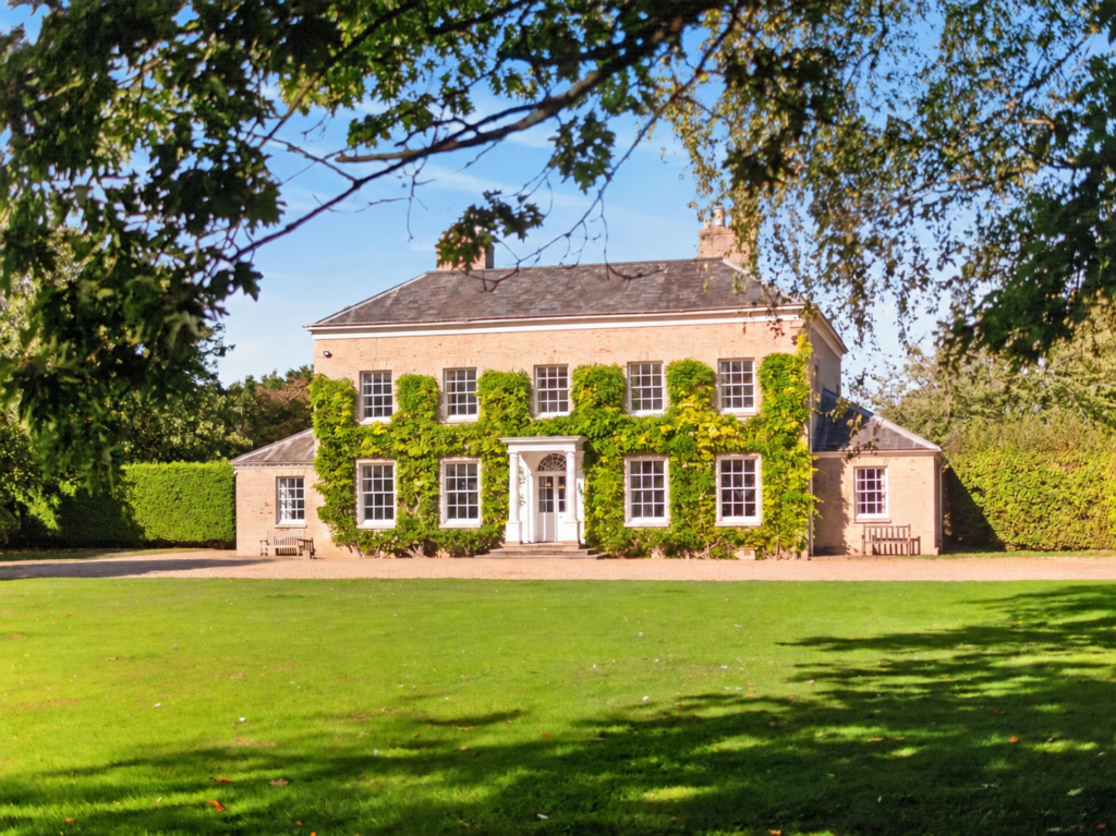 Loddon Hall Georgian country house seen across the front lawn, Norfolk